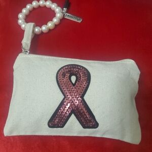 Elegant Cream Cosmetic Bag with Pink Sequin Detail